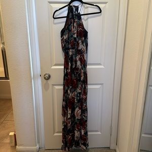 Floral floor length halter with a cute peep hole in the back